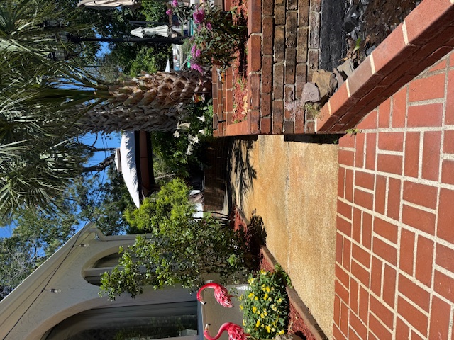 Prayer garden walkway with flamingo decorations